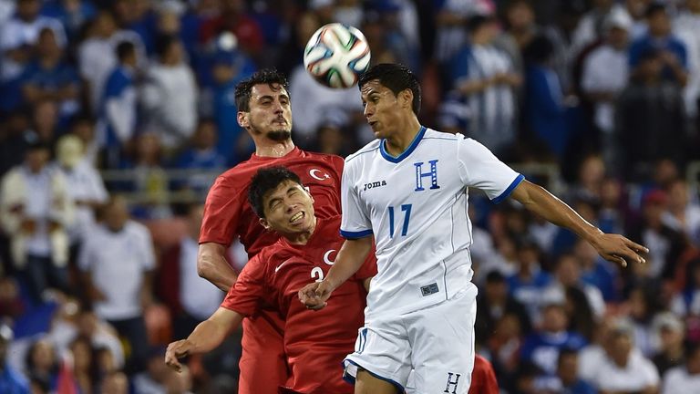 Midfielder ANdy Najar (R) of Honduras vies with Turkey's defender Ishak Dogan (bottom) and forward Mustafa Pektemek during a World Cup preparation friendly