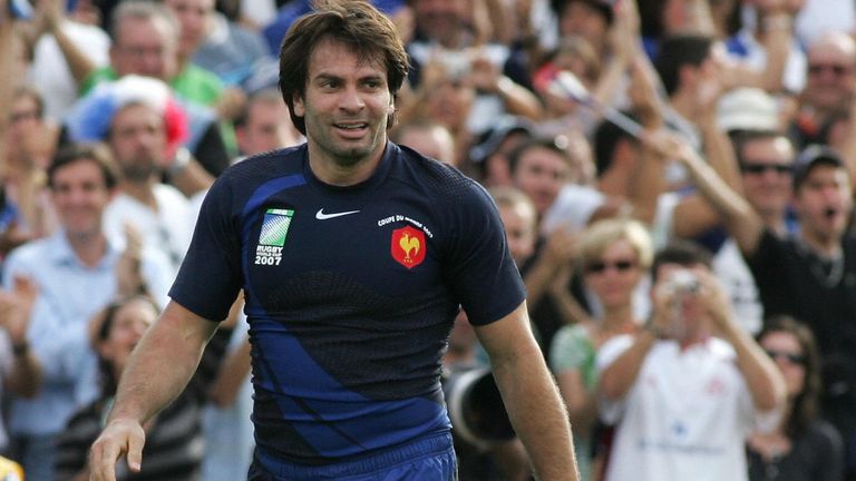 France's winger Christophe Dominici walks on the field after scoring during the rugby union World Cup group D match France vs. Georgia, 30 September 2007 at the Velodrome stadium in the southern city of Marseille. AFP PHOTO / ANNE-CHRISTINE POUJOULAT (Photo credit should read ANNE-CHRISTINE POUJOULAT/AFP via Getty Images)