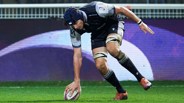 Josh Basham of Newcastle Falcons dives over to score his team's second try during the European Rugby Challenge Cup match between Castres and Newcastle Falcons at Stade Pierre-Fabre on December 18, 2020 in Castres, Tarn. (Photo by Juan Manuel Serrano Arce/Getty Images for EPCR)