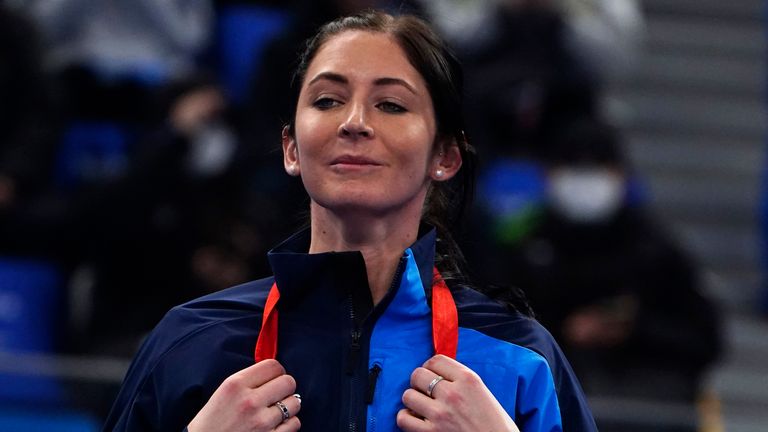 Britain's Eve Muirhead, from the gold medalist team, celebrates during a medal ceremony for the women's curling at the Beijing Winter Olympics Sunday, Feb. 20, 2022, in Beijing. (AP Photo/Brynn Anderson)