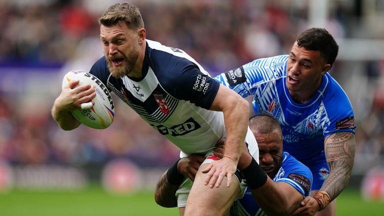 England v Samoa - Rugby League World Cup - Group A - St James' Park
England's Elliott Whitehead is tackled by Samoa's Jaydn Su'a and Junior Paulo during the Rugby League World Cup group A match at St James' Park, Newcastle upon Tyne. Picture date: Saturday October 15, 2022.