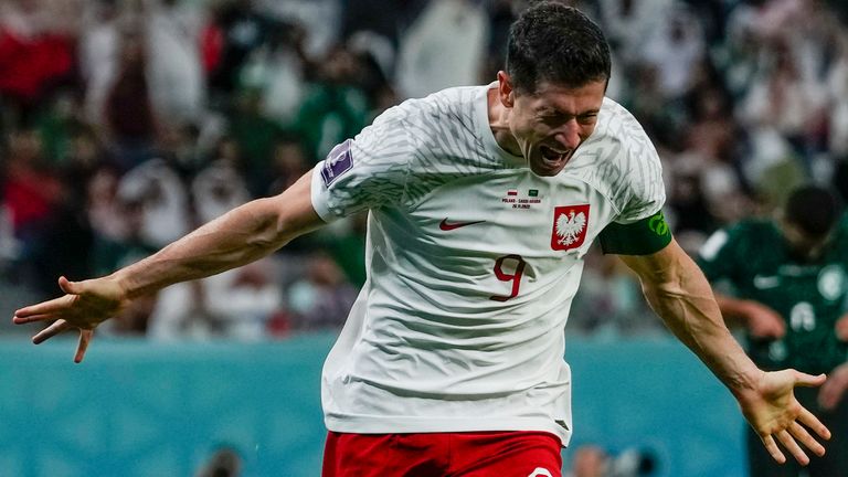 Poland's Robert Lewandowski celebrates scoring his side's 2nd goal during the World Cup group C soccer match between Poland and Saudi Arabia, at the Education City Stadium in Al Rayyan , Qatar, Saturday, Nov. 26, 2022. (AP Photo/Manu Fernandez)