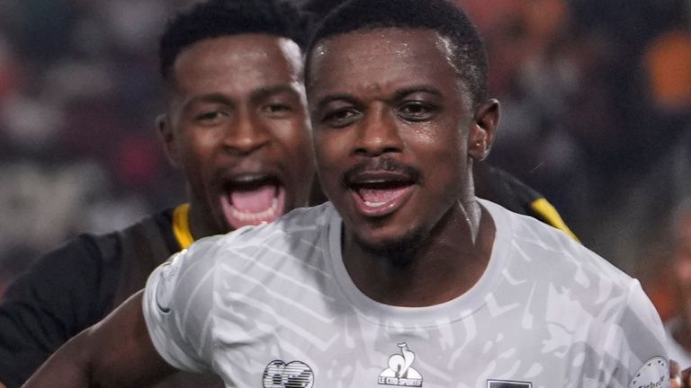 South Africa's Teboho Mokoena, right, celebrates with teammates after scoring his sides second goal during the African Cup of Nations round of 16 soccer match between Morocco and South Africa, at the Laurent Pokou stadium in San P..dro, Ivory Coast, Tuesday, Jan. 30, 2024. (AP Photo/Sunday Alamba)