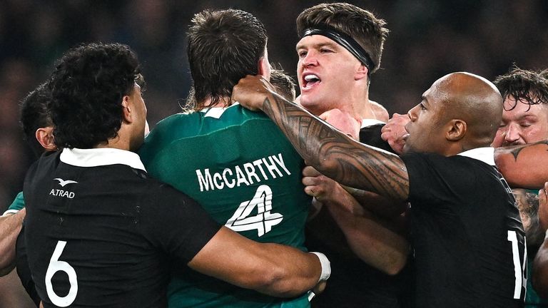Joe McCarthy of Ireland tussles with Scott Barrett of New Zealand during the Autumn Nations Series