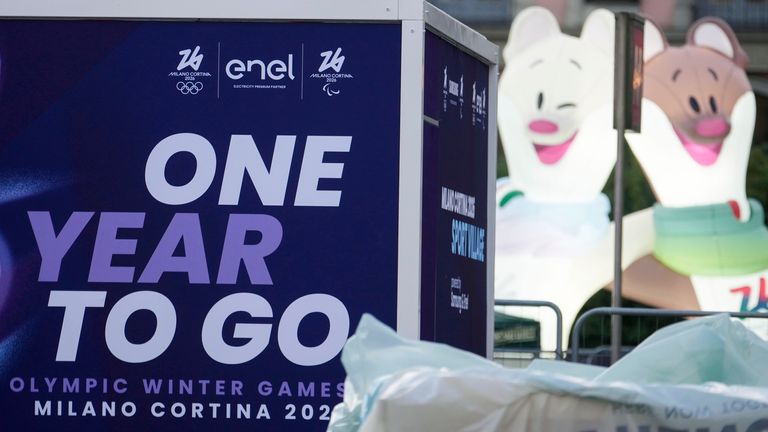 Official Milano-Cortina Winter Olympics 2026 Mascotte Tina and Milo are displayed at the Duomo square, in Milan, Italy, Wednesday, Feb. 5, 2025. (AP Photo/Luca Bruno)