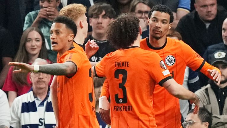 Frankfurt's Hugo Ekitike, right, celebrates after scoring the opening goal during the Europa League quarterfinals first leg soccer match between Tottenham Hotspur and Eintracht Frankfurt at the Tottenham Hotspur Stadium in London, England, Thursday, April 10, 2025. (AP Photo/Frank Augstein)
