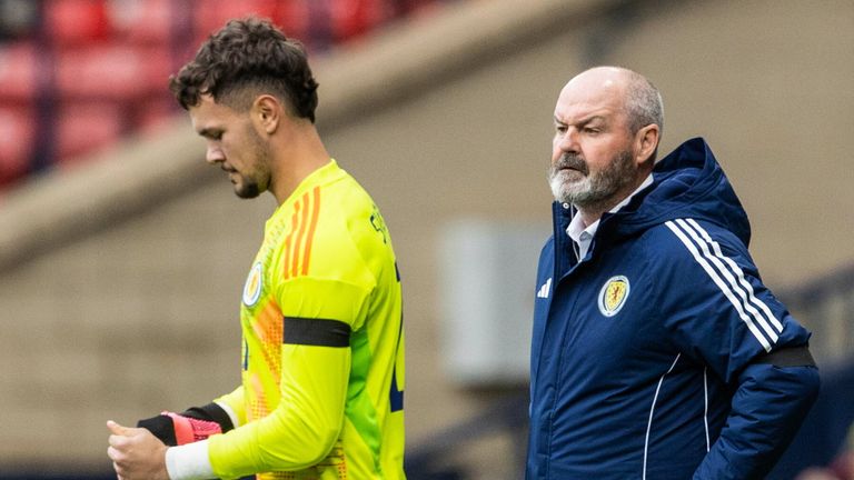 GLASGOW, SCOTLAND - JUNE 06: Scotland Head Coach Steve Clarke (R) and Cieran Slicker (C) as he is substituted on during an International Friendly match between Scotland and Iceland at Hampden Park, on June 06, 2025, in Glasgow, Scotland. (Photo by Alan Harvey / SNS Group)