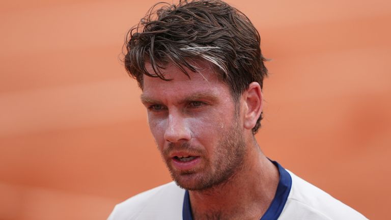 Britain's Cameron Norrie looks on as he plays Argentina's Federico Gomez during their second round match of the French Tennis Open, at the Roland-Garros stadium, in Paris, Thursday, May 29, 2025. (AP Photo/Lindsey Wasson)